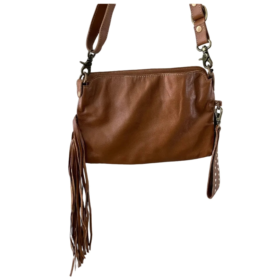 Brown leather handbag with fringes on a white background