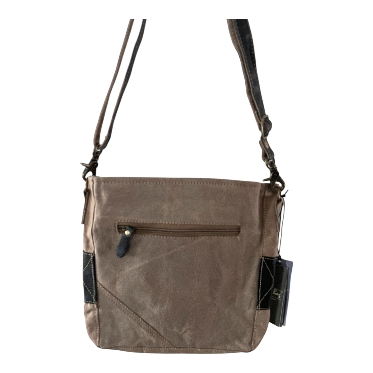 Brown leather crossbody bag with a visible brand tag on a white background