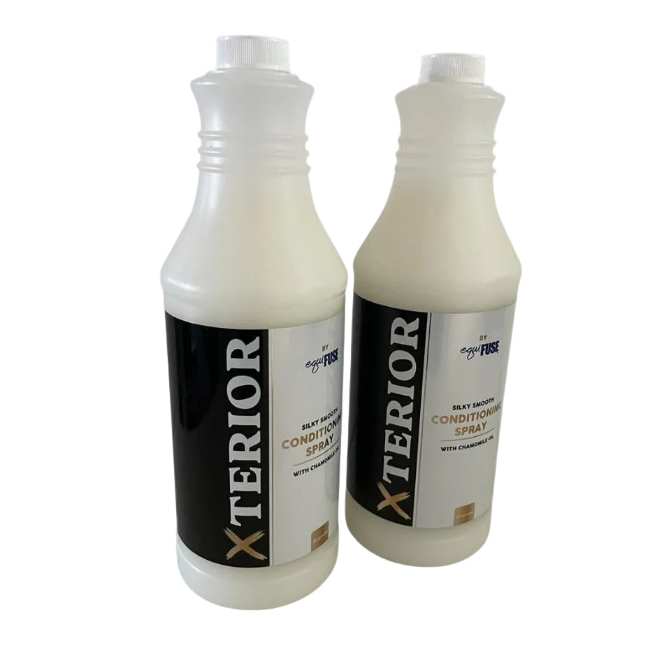 Two bottles of Xterior car care product on a white background