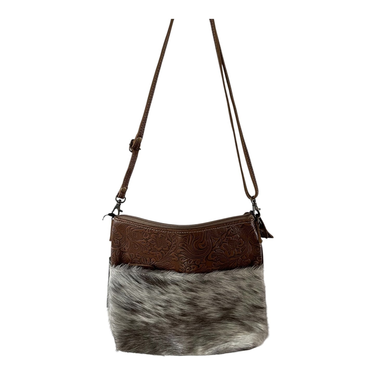 Brown leather and gray cowhide crossbody bag on a white background