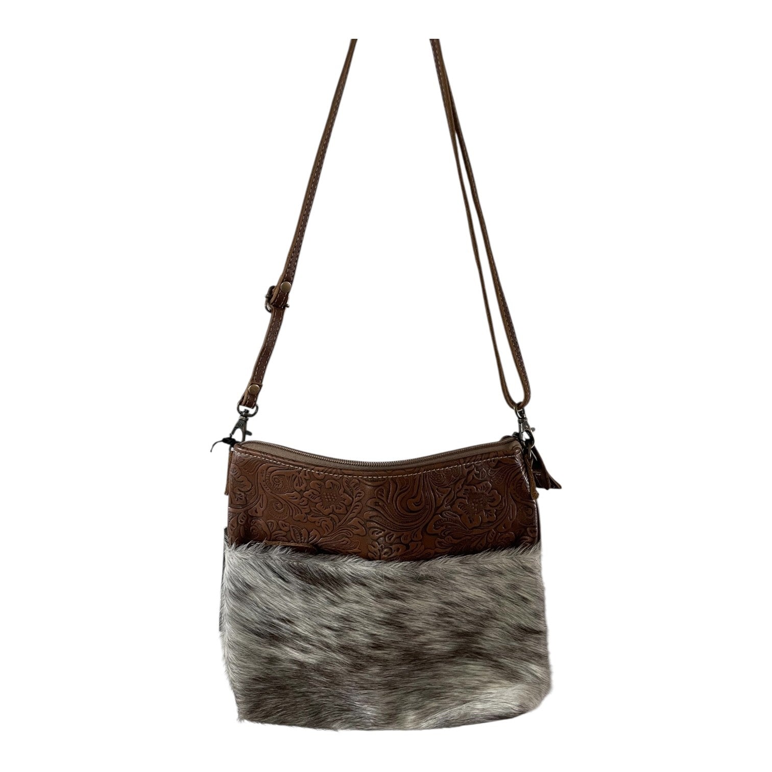 Brown leather and gray cowhide crossbody bag on a white background