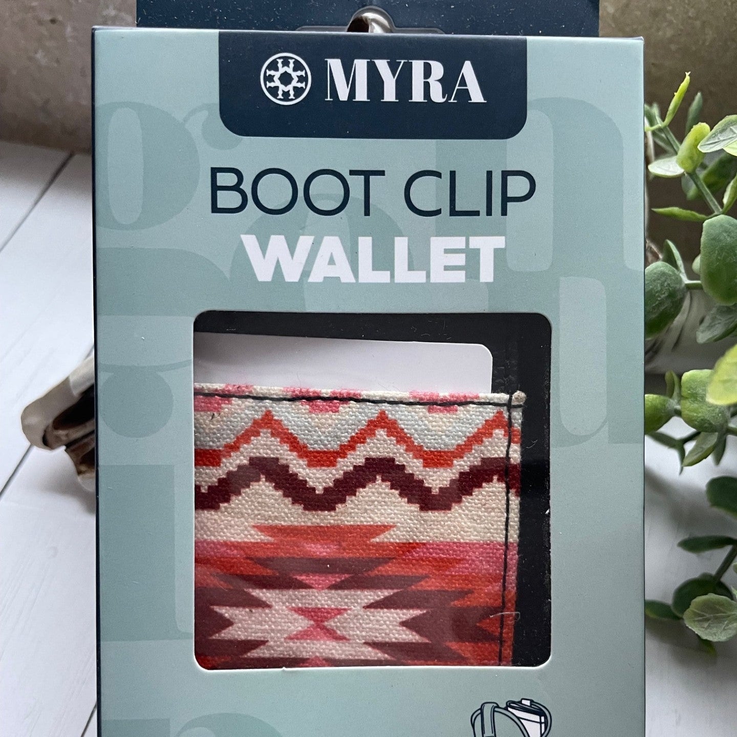 MYRA boot clip wallet packaging with product image and text on a light background