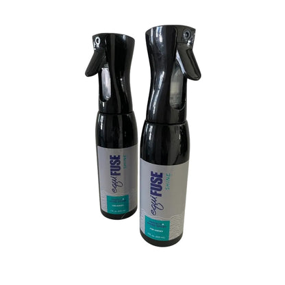 Two black spray bottles with 'Fuse' branding on a white background