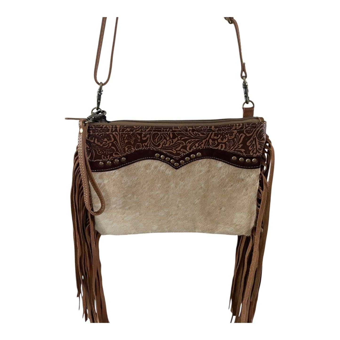 Brown and beige handbag with fringe details on a white background