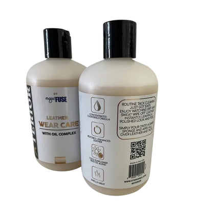 Two bottles of leather care product with labels on a white background