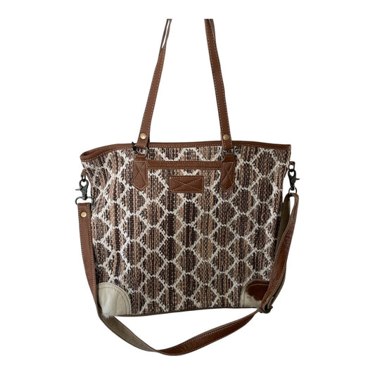 Patterned handbag with brown accents on a white background