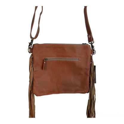 Brown leather crossbody bag with fringe details on a white background