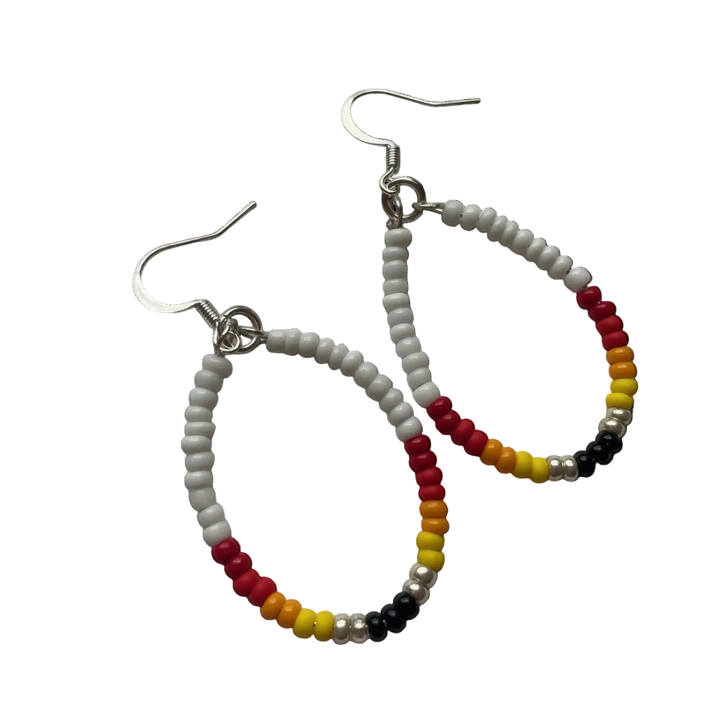 A pair of beaded hoop earrings with silver fishhook wires. The hoops are primarily composed of small white beads, with a segment of red, orange, yellow, and black beads on the lower left curve of each hoop.