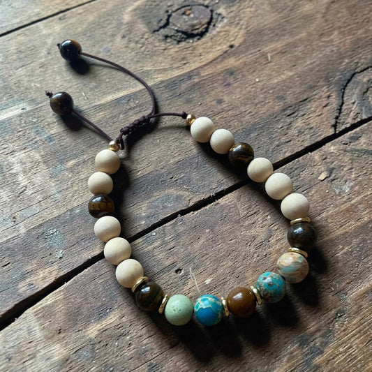 Necklace with beads on a wooden surface