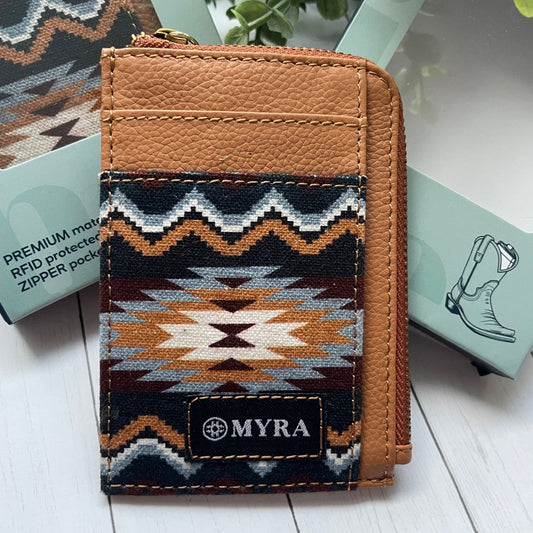 Brown wallet with geometric pattern and 'MYRA' branding on a white surface.