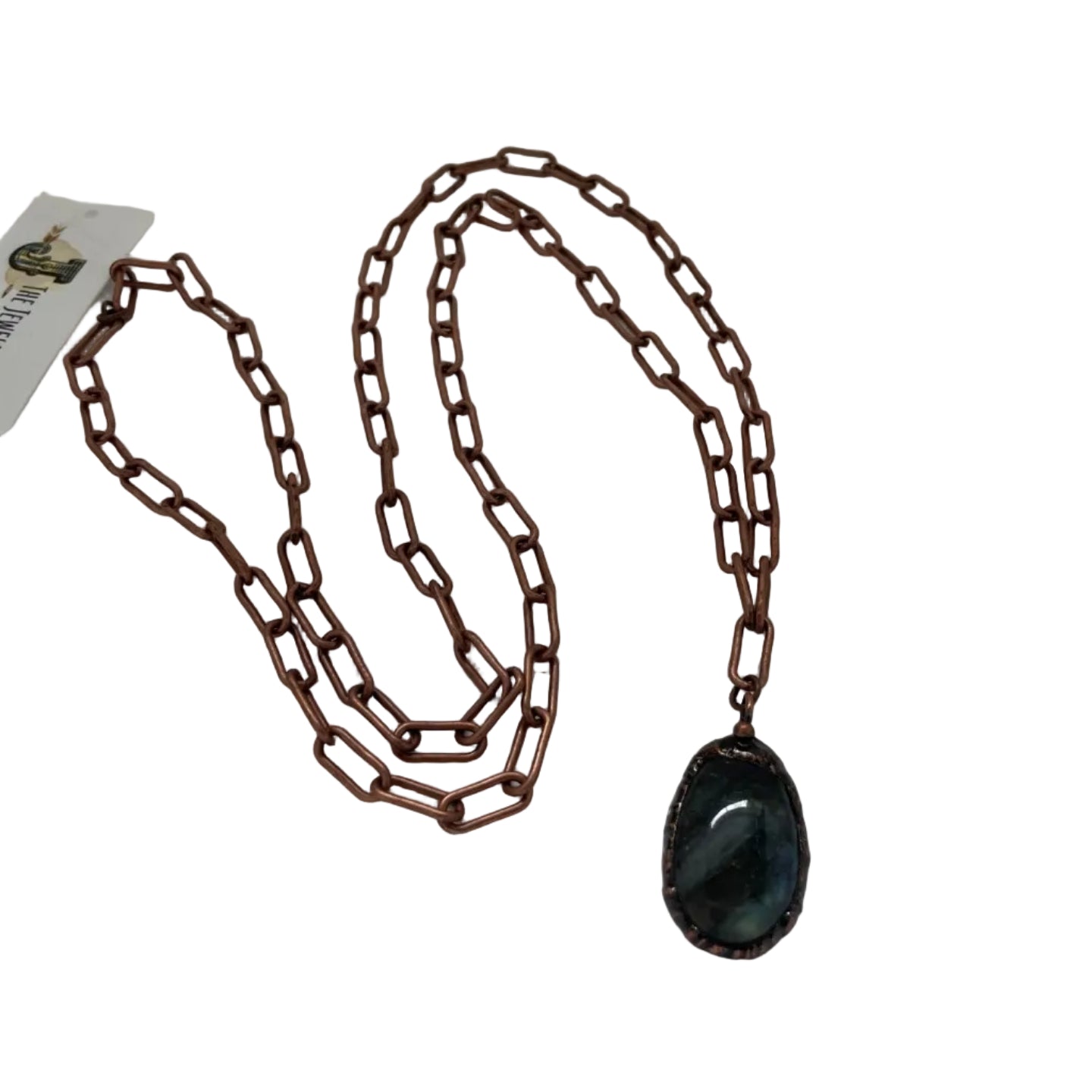 Necklace with a dark pendant on a white background