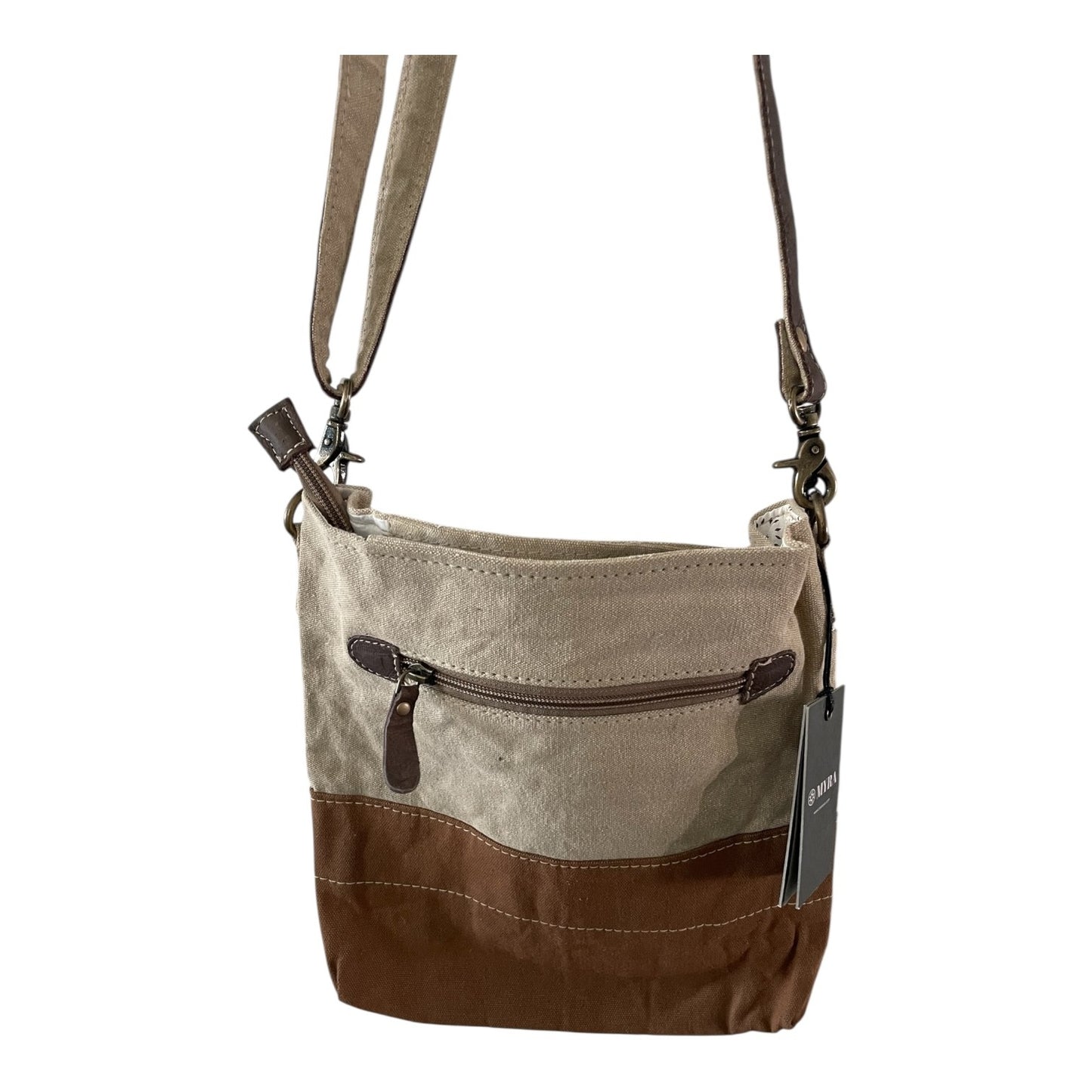 Brown and beige crossbody bag with a visible brand tag on a white background