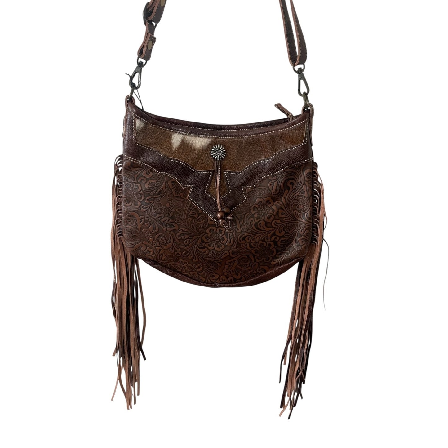 Brown leather handbag with fringe details on a white background