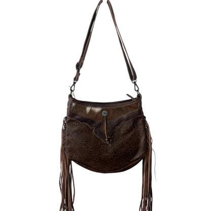 Brown leather handbag with fringe details on a white background