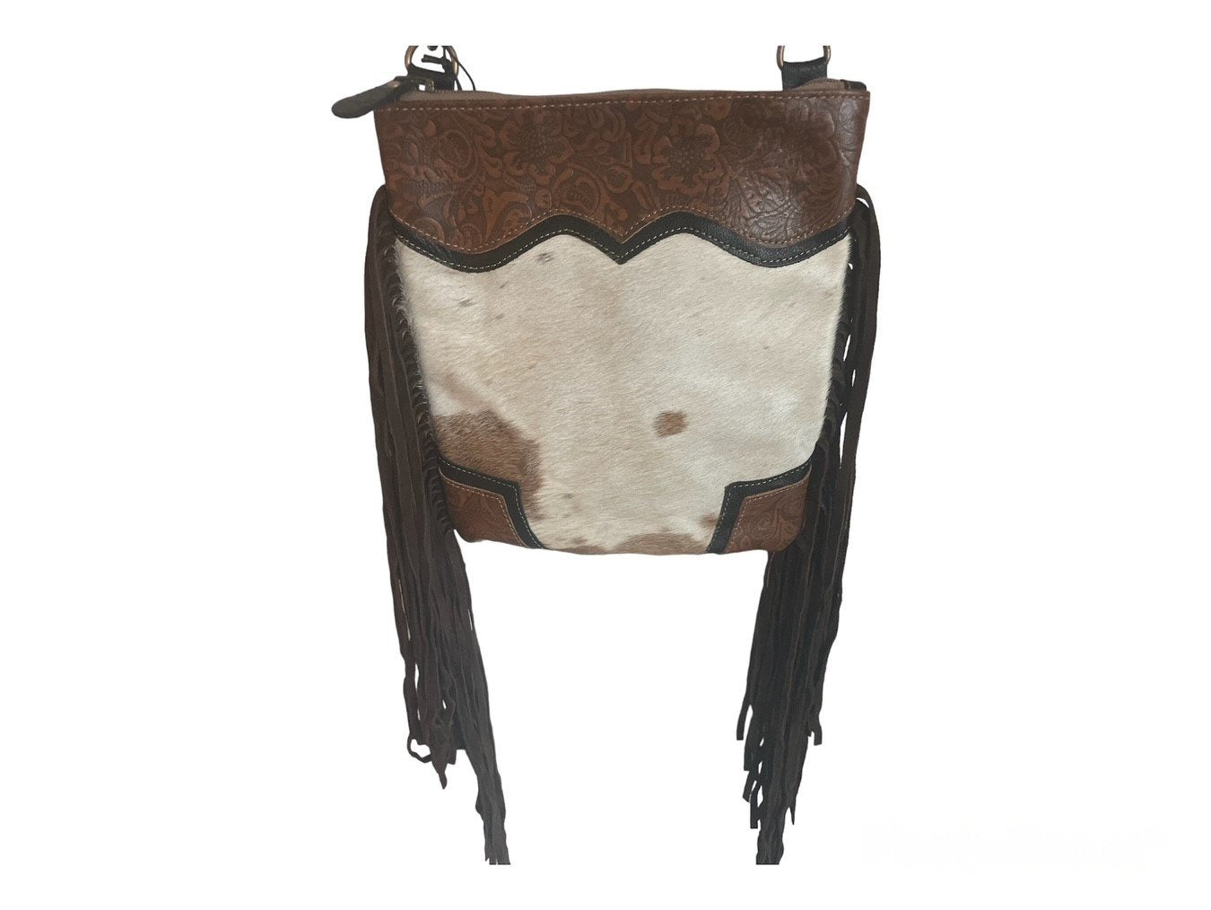 Brown and white leather bag with fringe on a white background