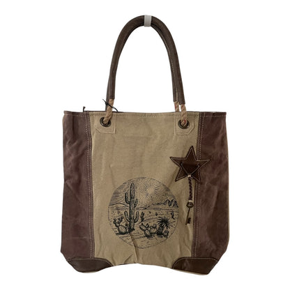 Tote bag with desert scene design and star detail on a white background