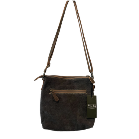 Brown leather crossbody bag with a strap on a white background