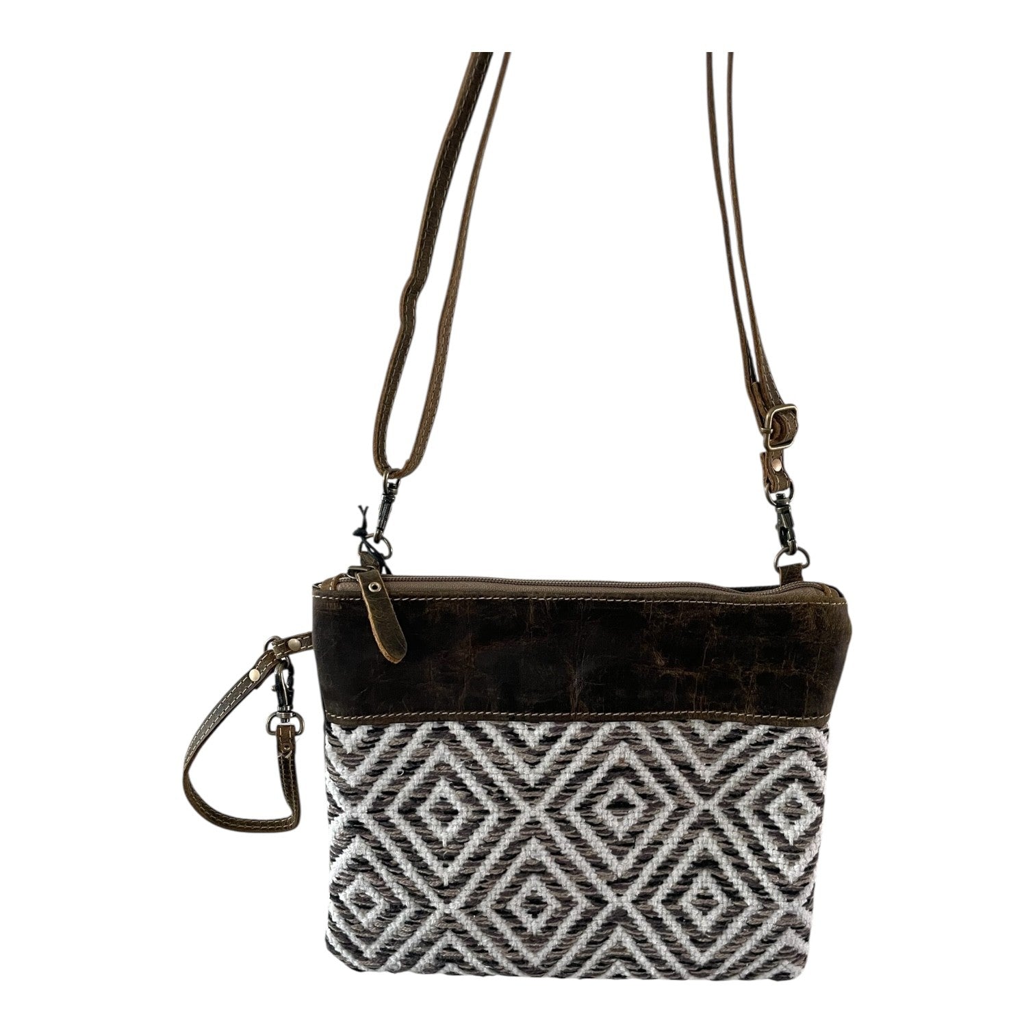 Crossbody bag with black and white pattern on a white background