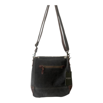 Black shoulder bag with a visible brand tag on a white background