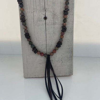 Jasper stone and wood round beads necklace with a leather tassel on a long necklace