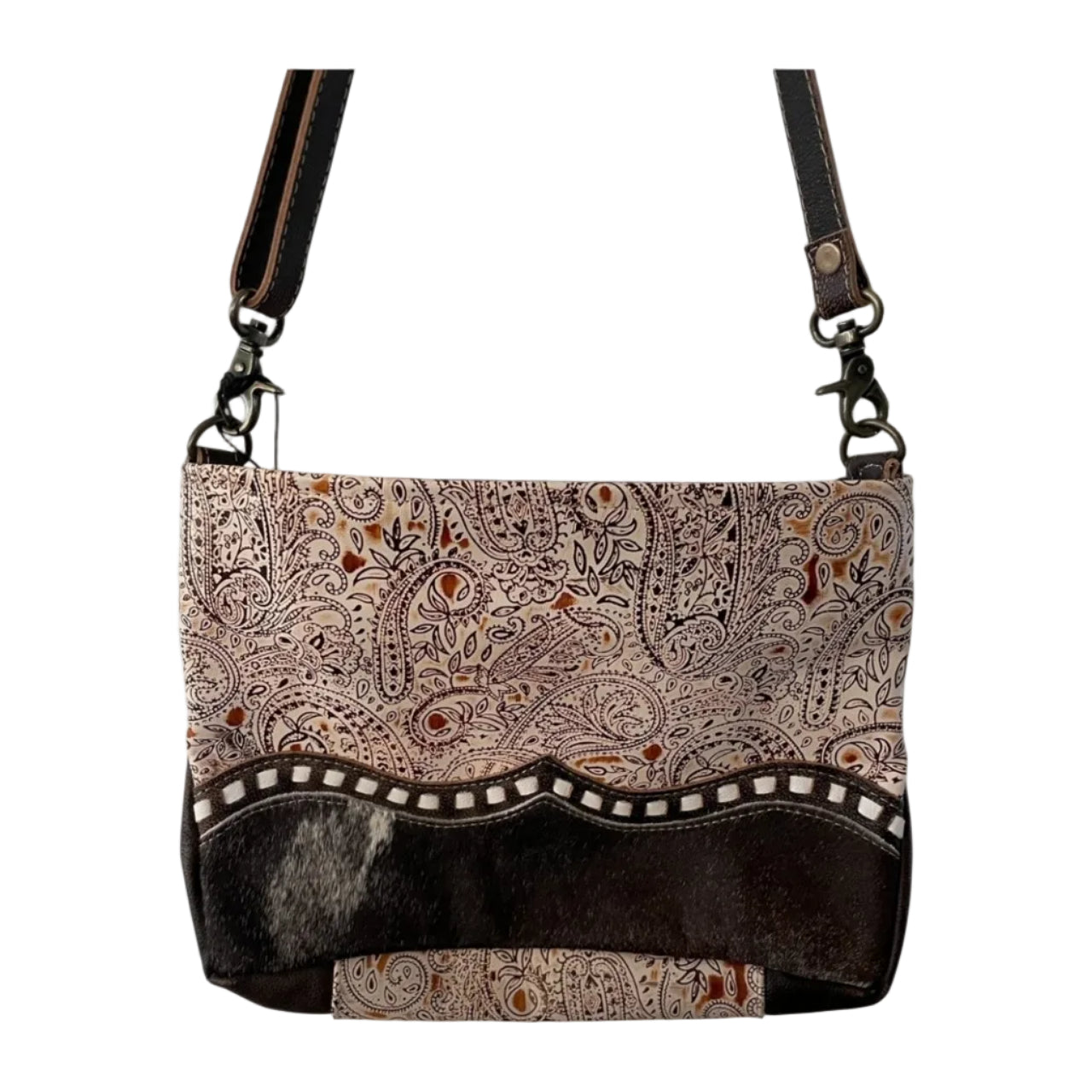 Patterned handbag with leather accents on a white background