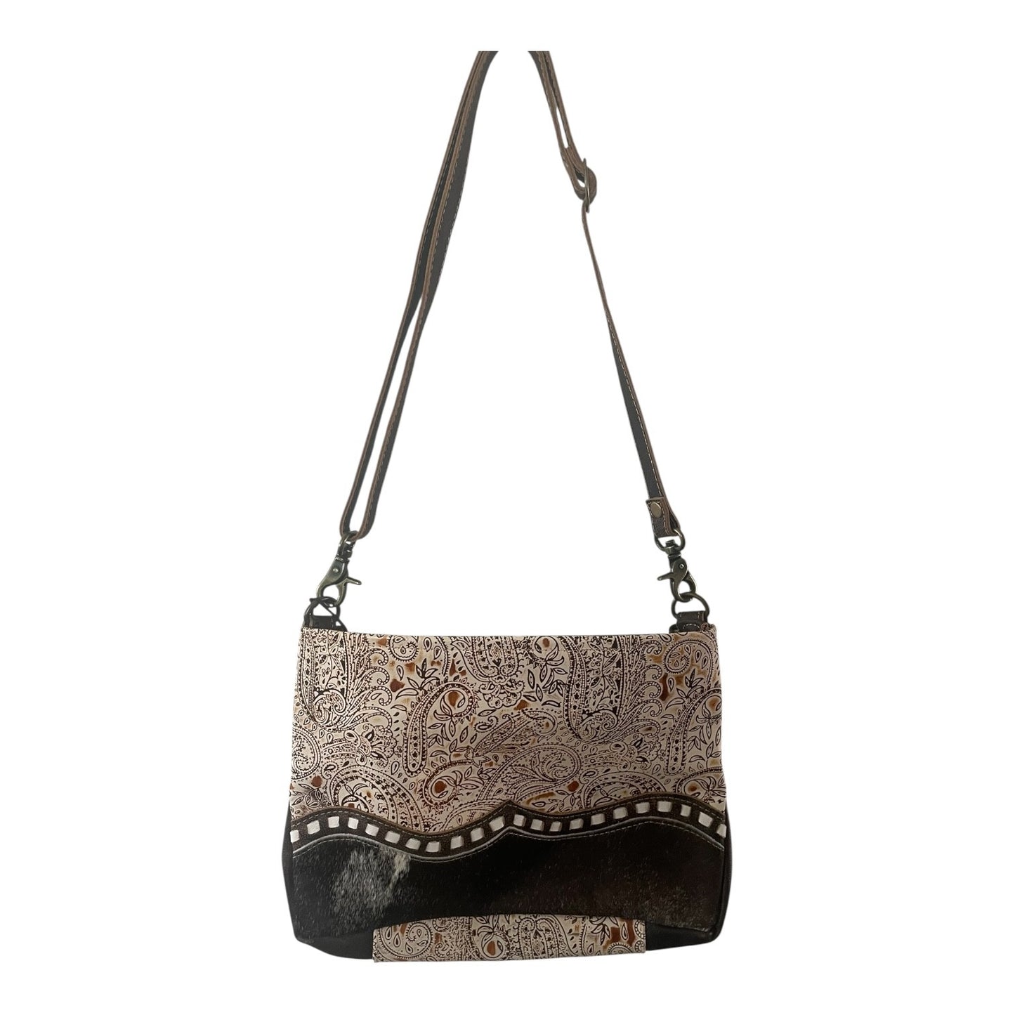 Patterned handbag with a strap on a white background