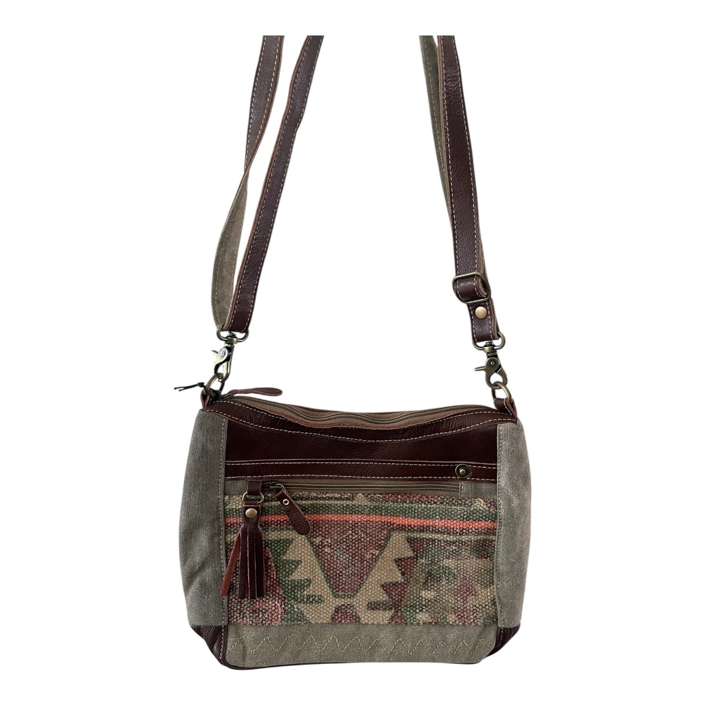 Gray shoulder bag with tribal pattern and brown accents on a white background