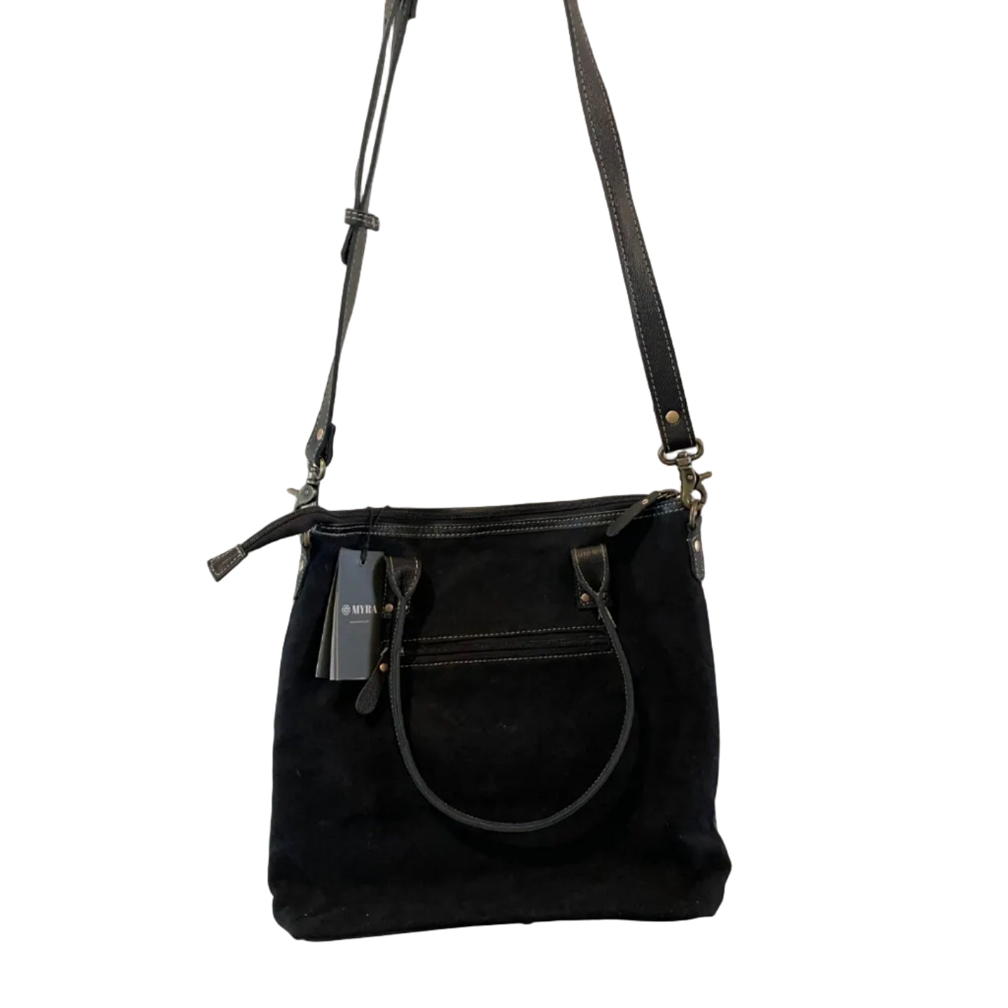 Black handbag with a strap on a white door background