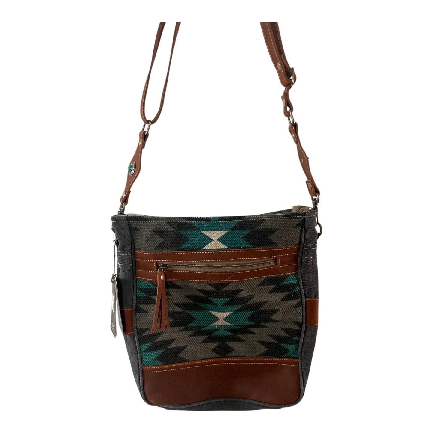 Patterned handbag with brown accents on a white background