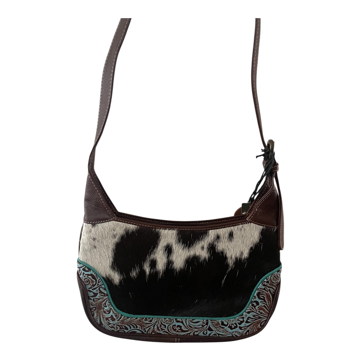 Brown and black patterned handbag with a strap on a white background