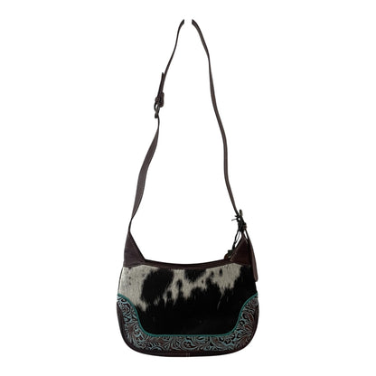 Black and white patterned shoulder bag with decorative trim on a white background