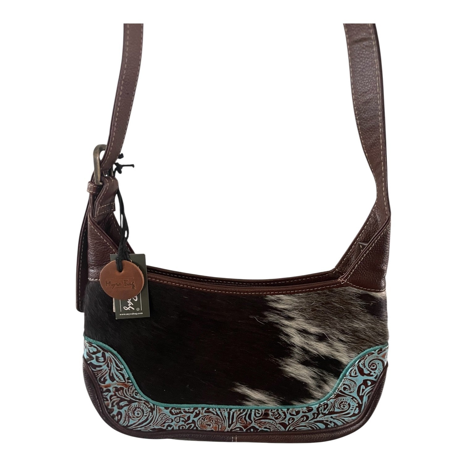 Brown leather handbag with cowhide pattern and decorative trim on a white background