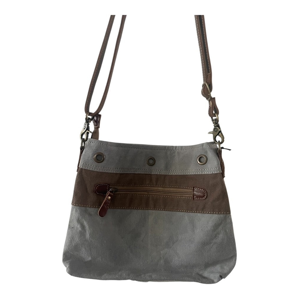 Gray shoulder bag with brown accents on a white background