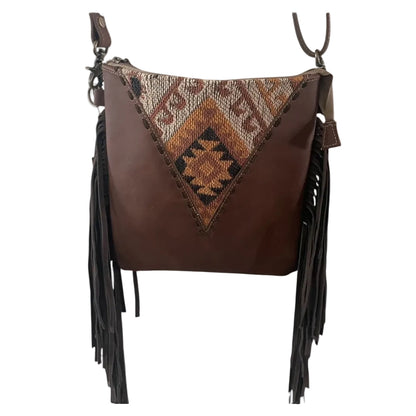 Brown leather purse with southwest print and stitch accents and fringe on the sides
