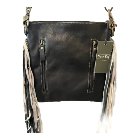 Black leather handbag with fringe details on a white background