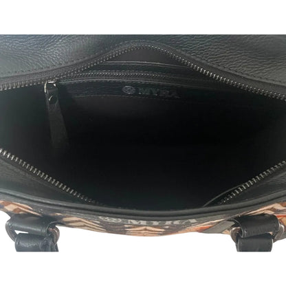 Black leather bag with visible brand logo on a white background
