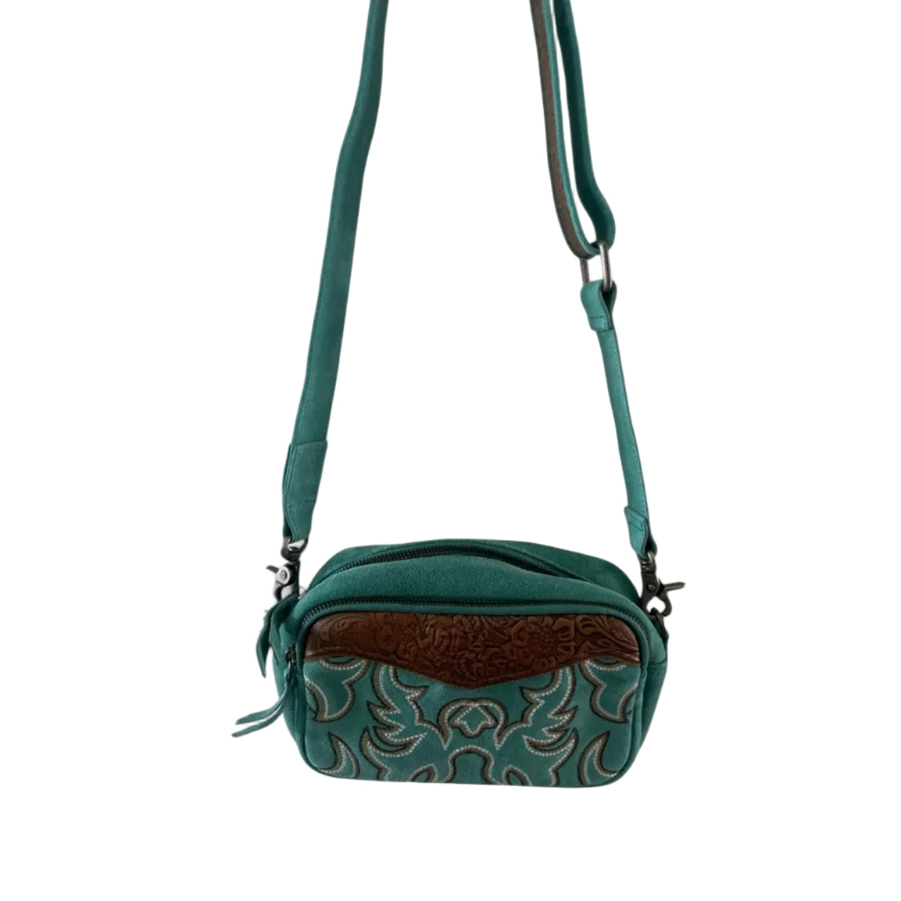 Teal crossbody bag with decorative pattern on a white background