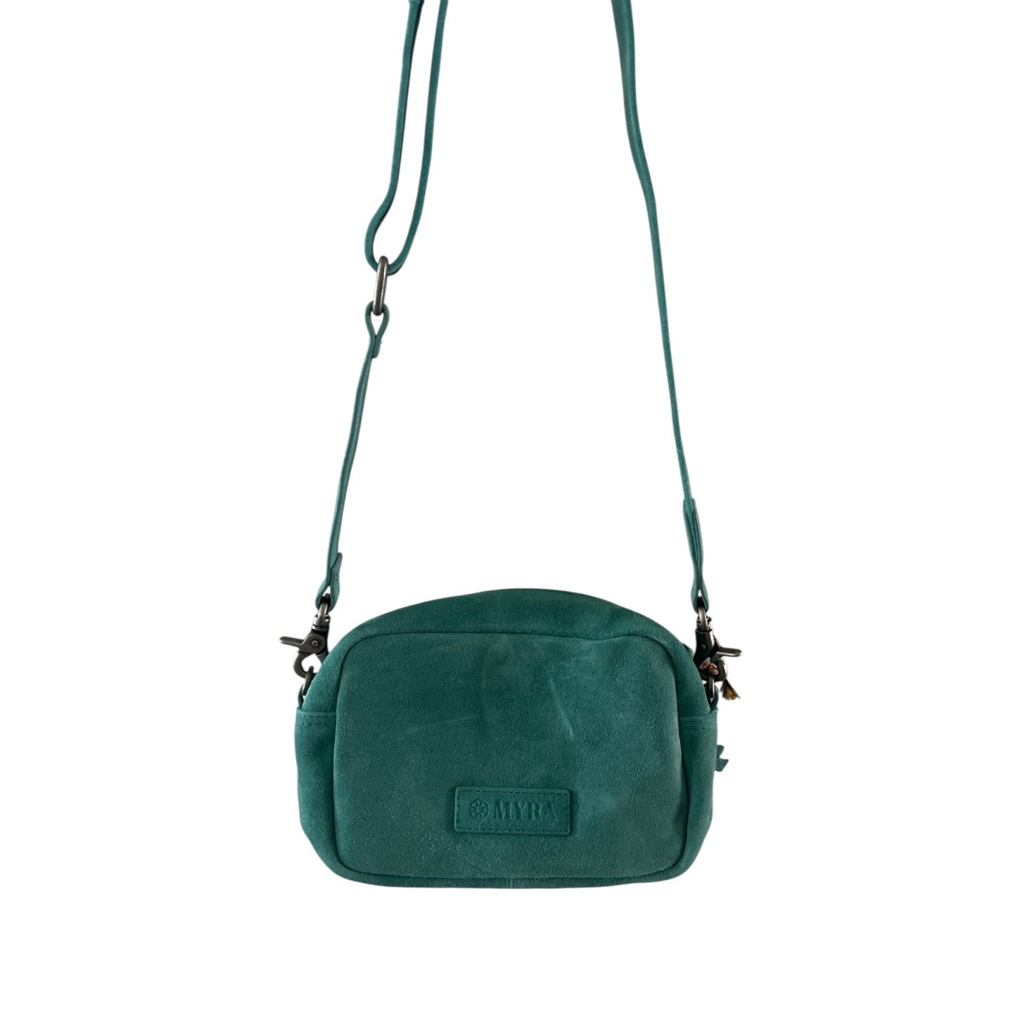 Green crossbody bag on a white background