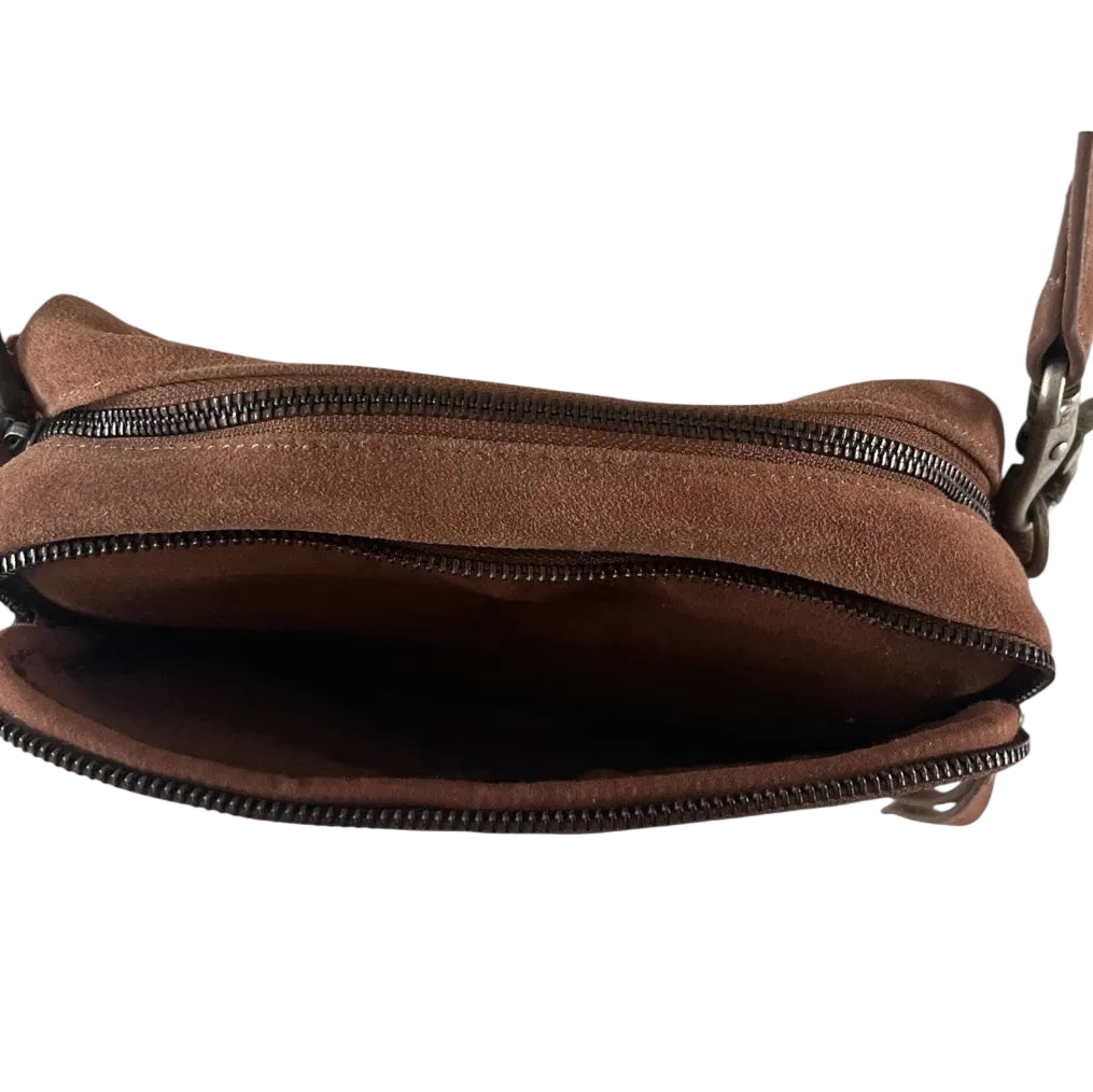 Brown leather bag with a zipper on a white background