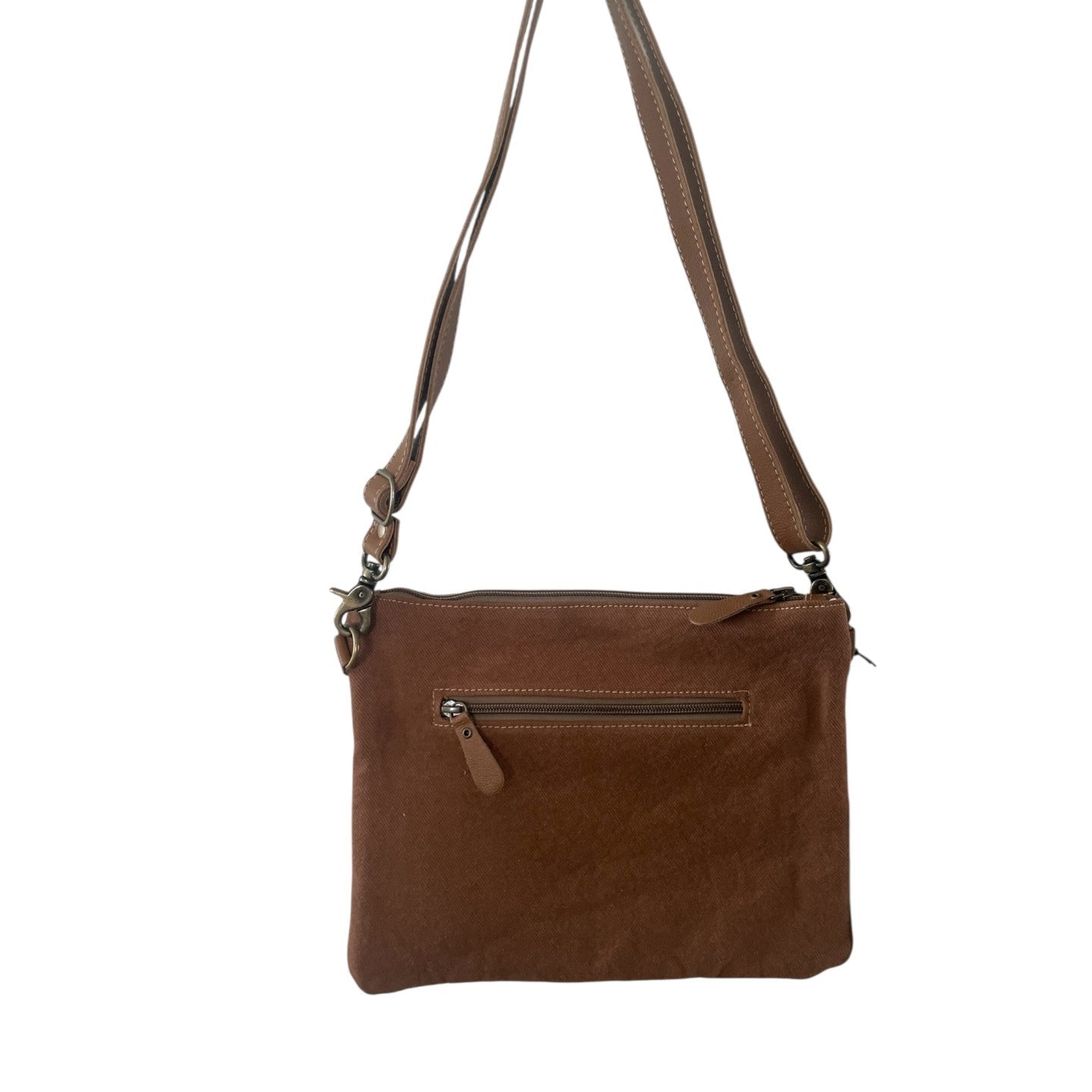 Brown leather crossbody bag on a white background