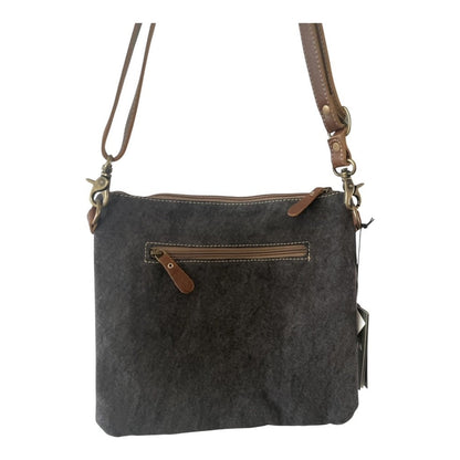 Gray crossbody bag with brown leather accents on a white background