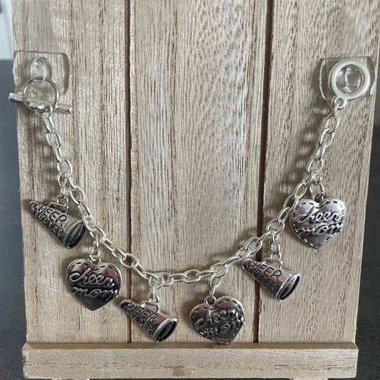 silver charms heart and cheer mom and megaphone on a silver toggle bracelet
