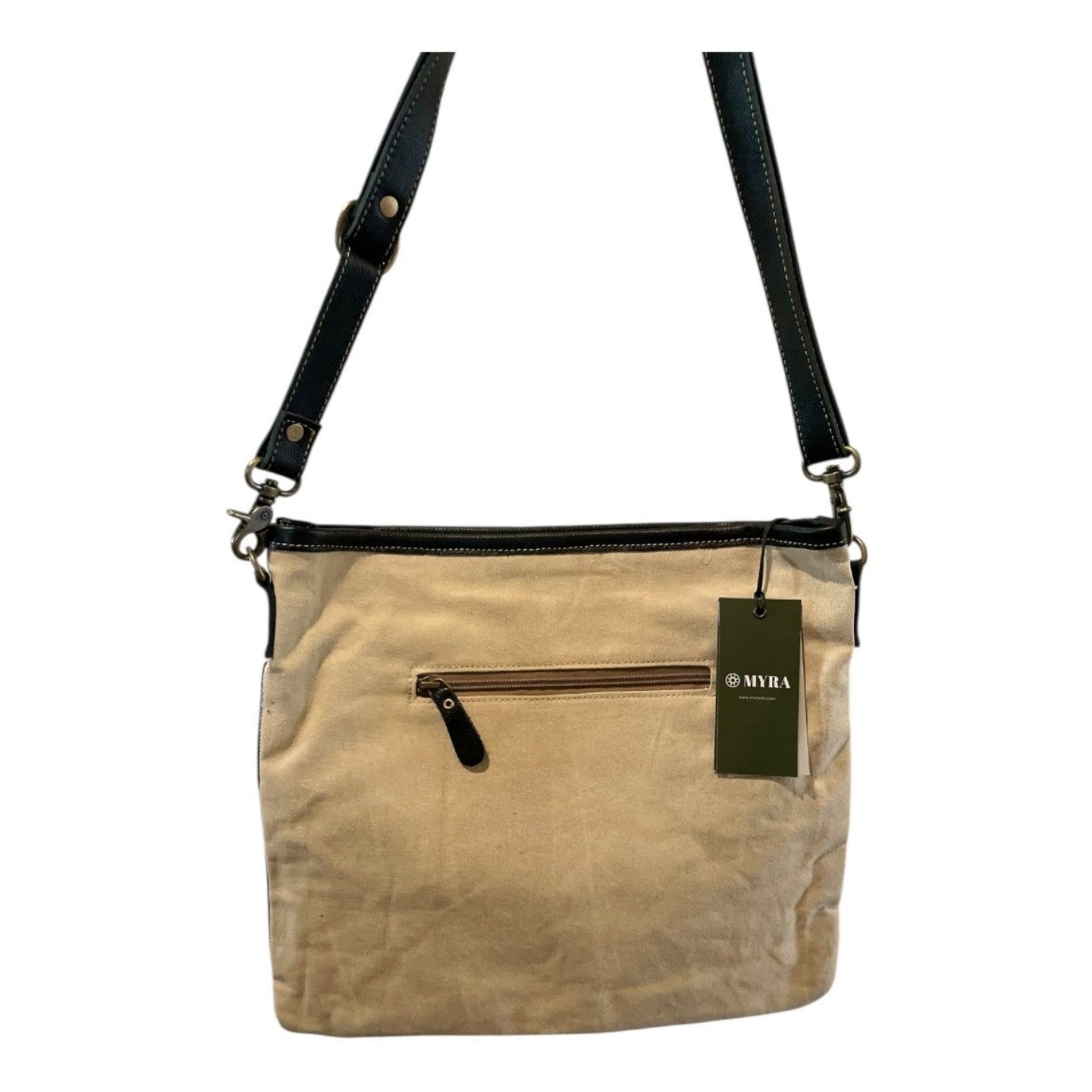 Beige handbag with black straps on a white background