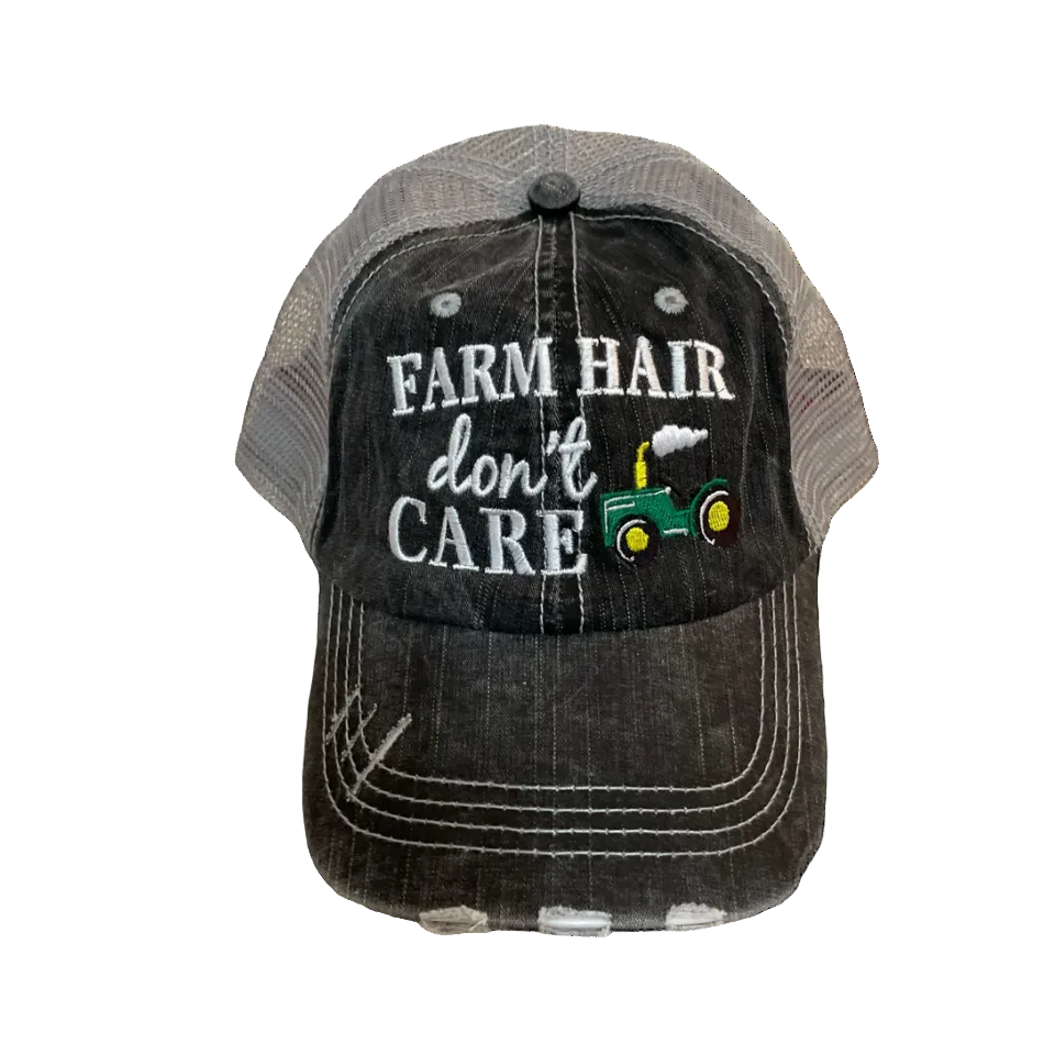 Cap with 'Farm Hair Don't Care' text and tractor graphic on a white background