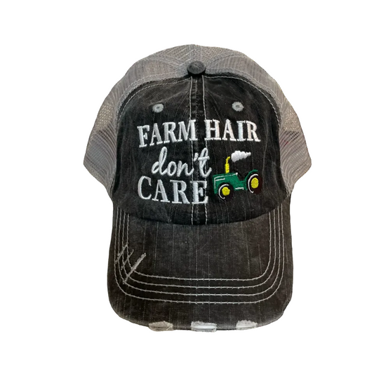 Cap with 'Farm Hair Don't Care' text and tractor graphic on a white background