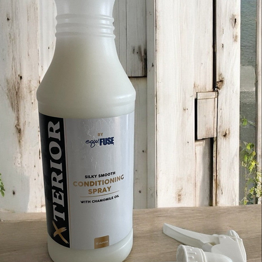 Exterior Horse Grooming Conditioning Spray in a tall bottle with a spray attachment 