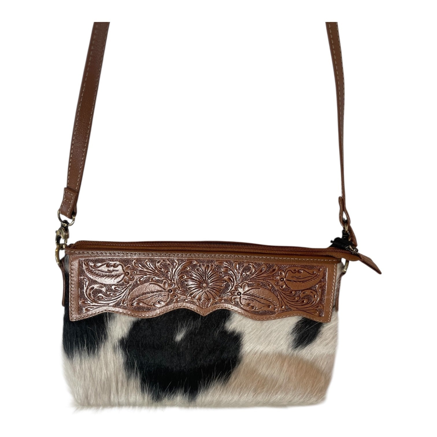 Black and white cowhide purse with tooled brown leather