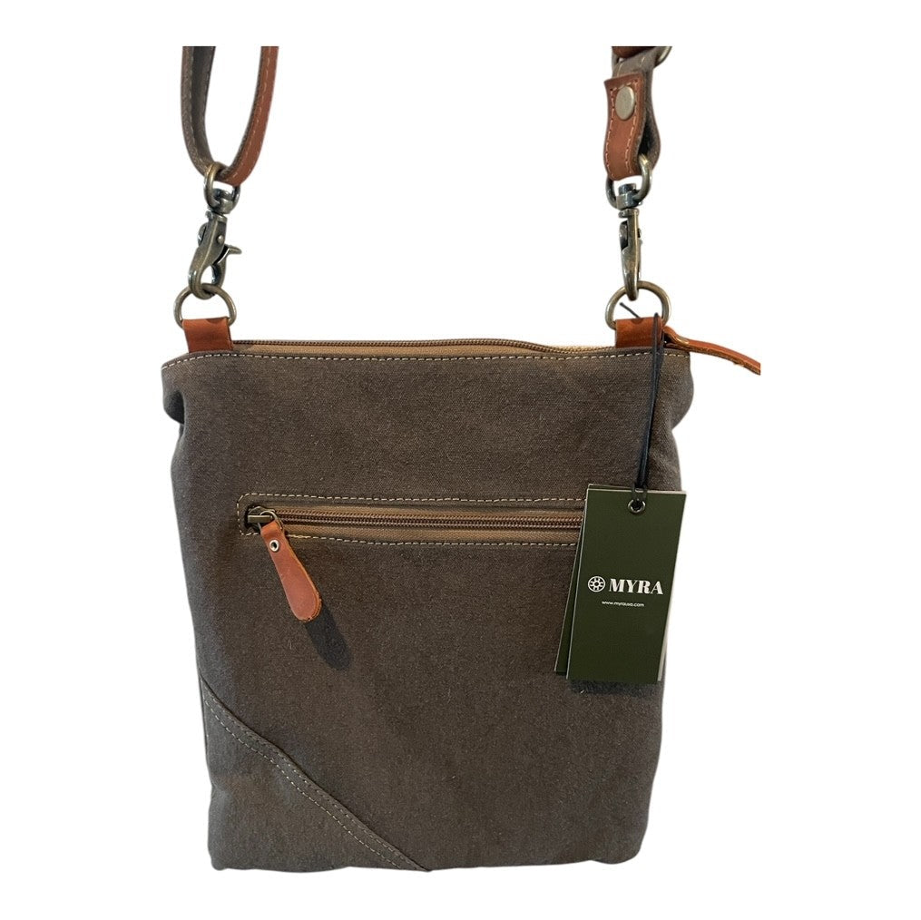 Brown canvas crossbody bag with leather accents and a visible brand tag on a white background
