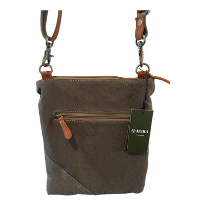 Brown canvas crossbody bag with leather accents and a visible brand tag on a white background