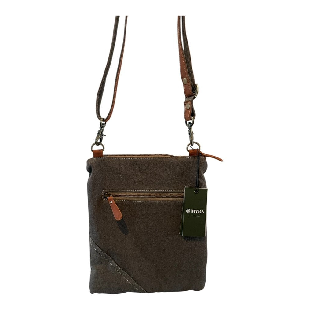 Brown crossbody bag with a visible brand tag on a white background